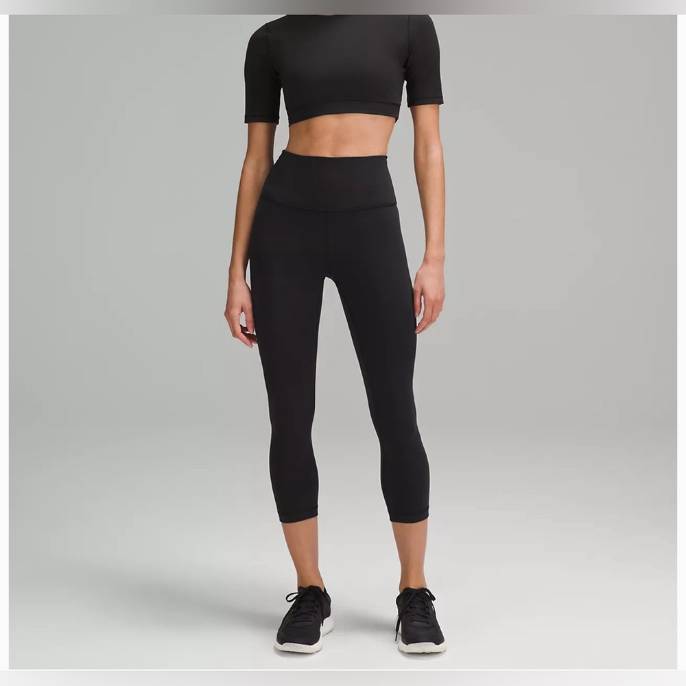 Lululemon black leggings, size 4. BARELY worn!